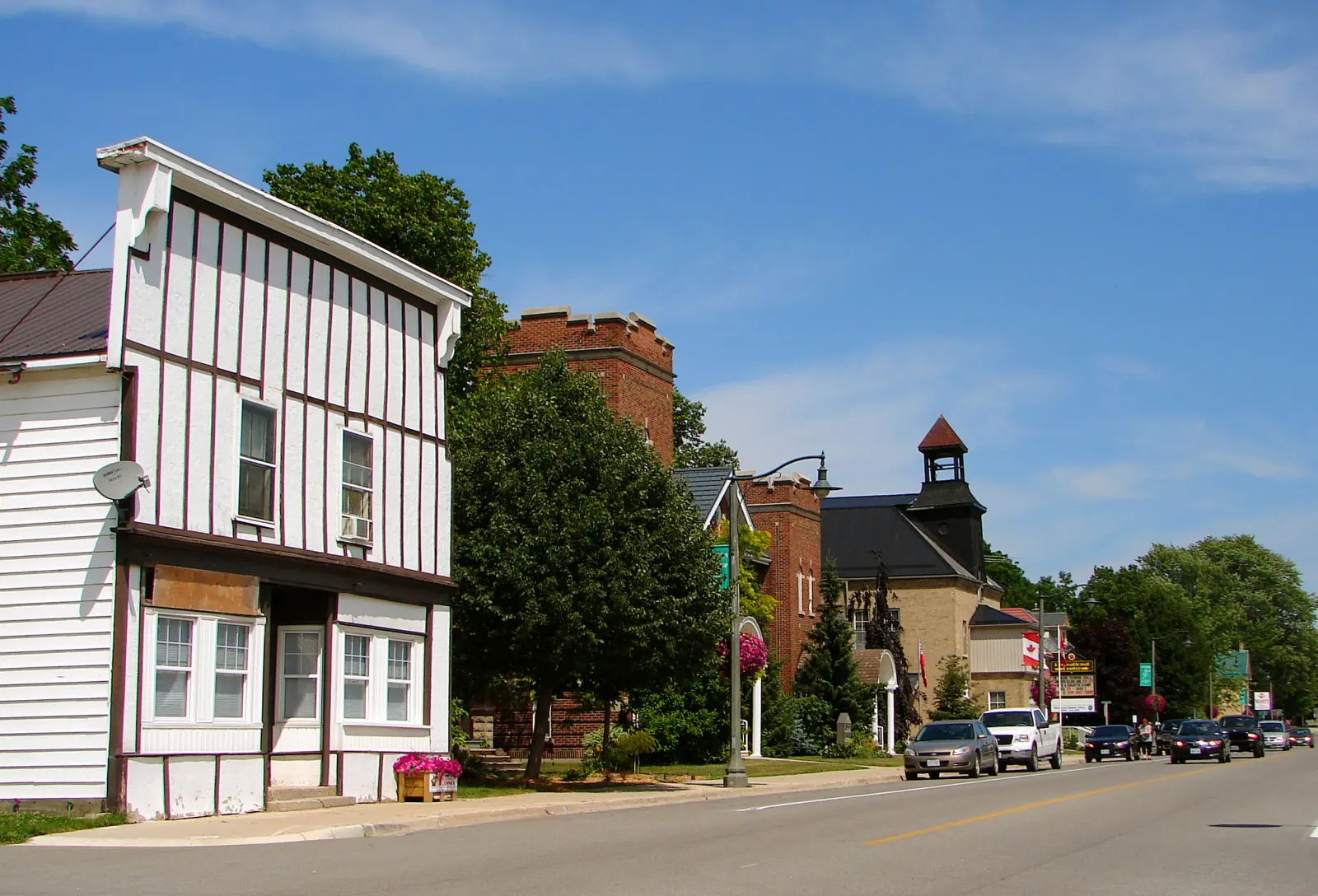 Shops and brick buildings along the main street in Ailsa Craig