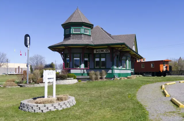 The restored 1904 railway station in Glencoe, painted green and grey