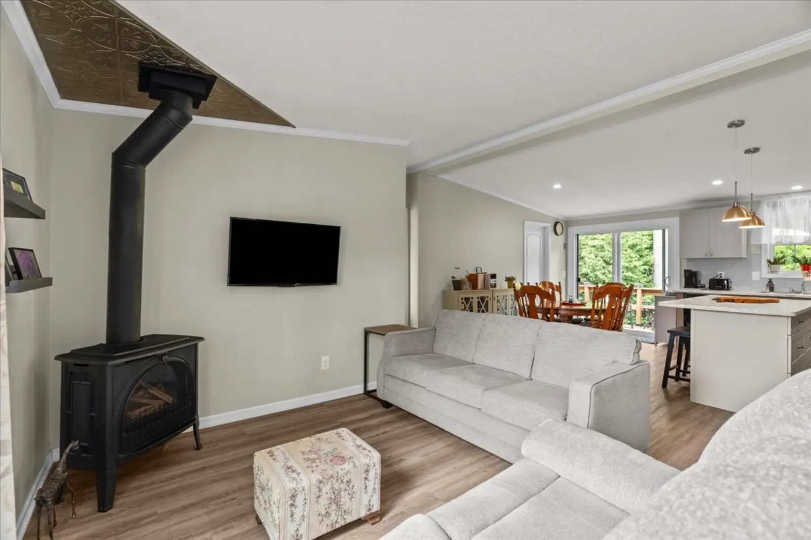 Living room with the freestanding gas fireplace