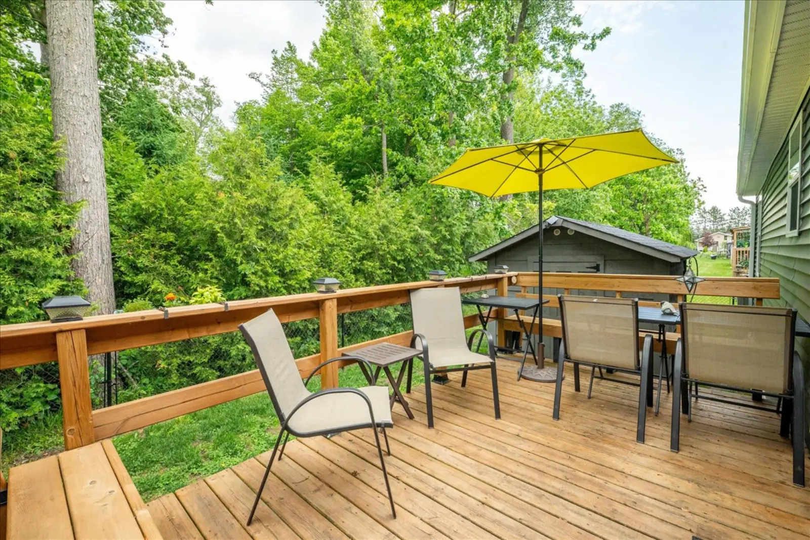 Deck with a table and umbrella