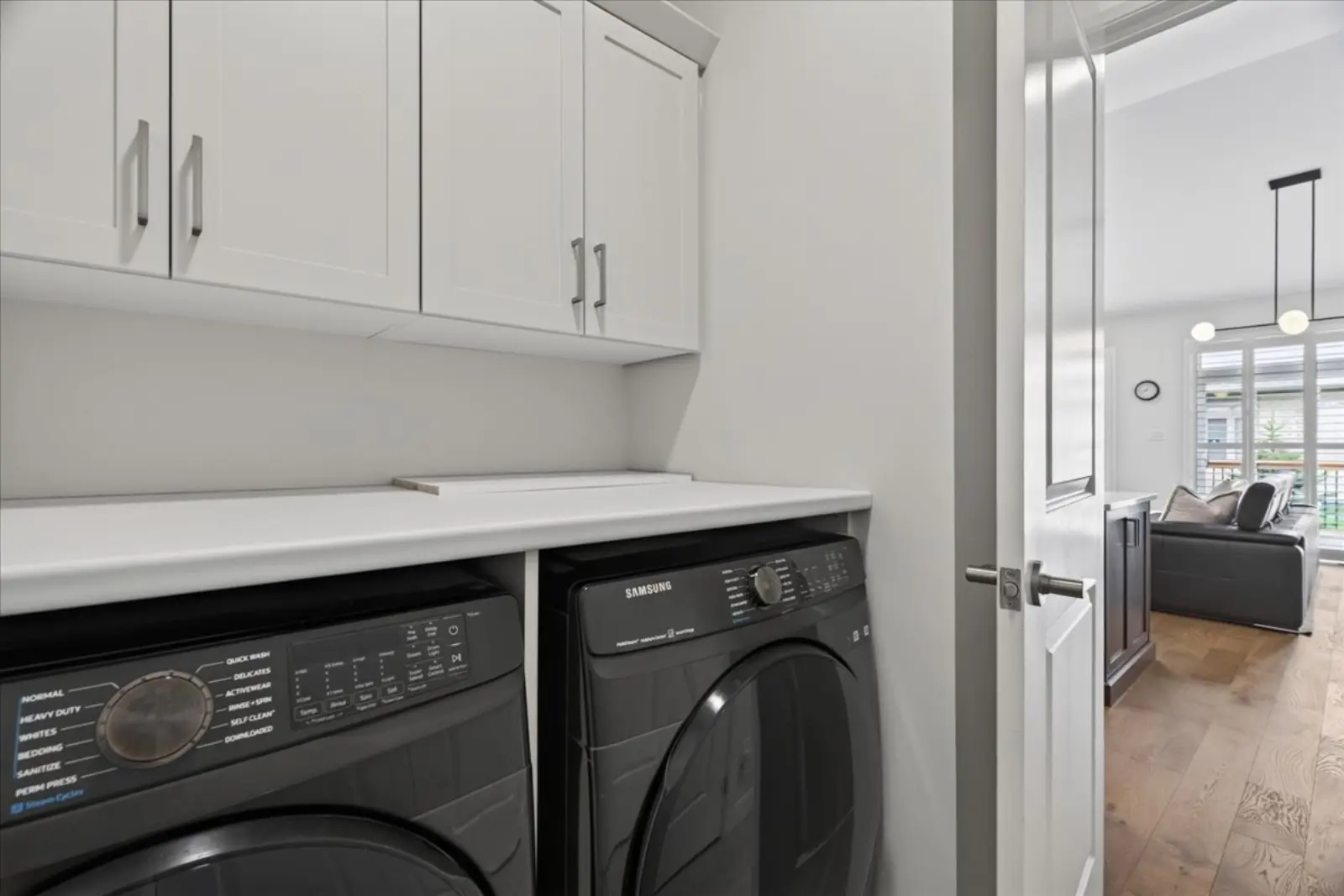 Laundry with built-in cabinets