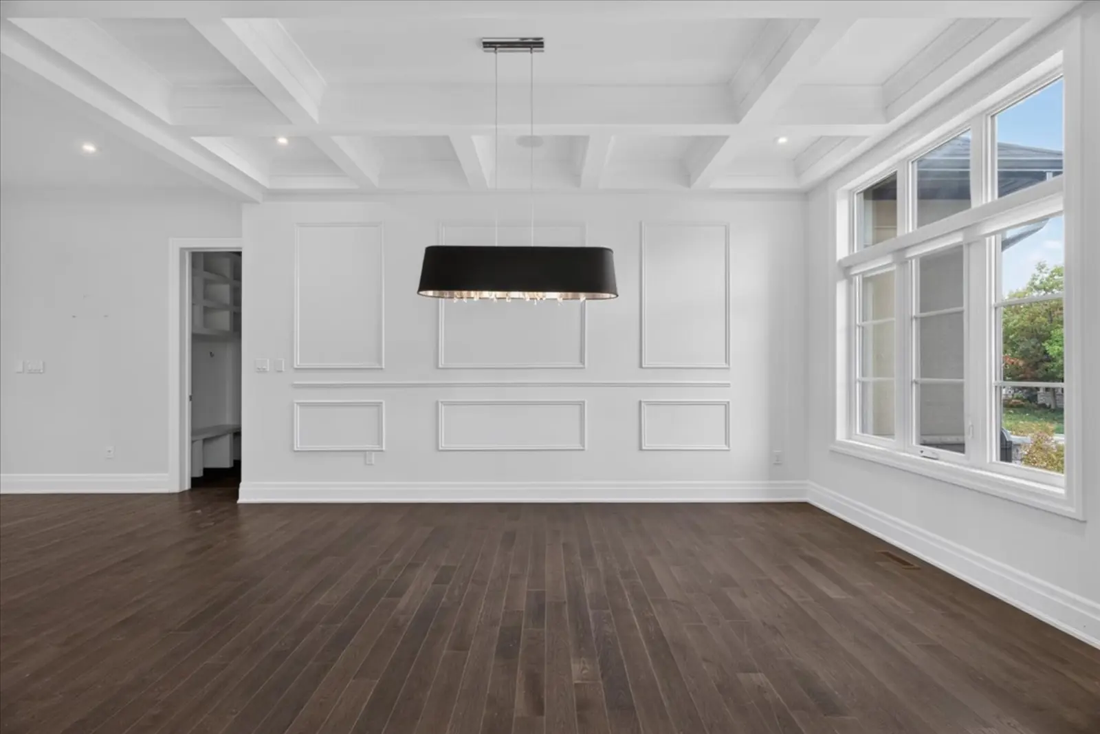 Dining room with a coffered ceiling