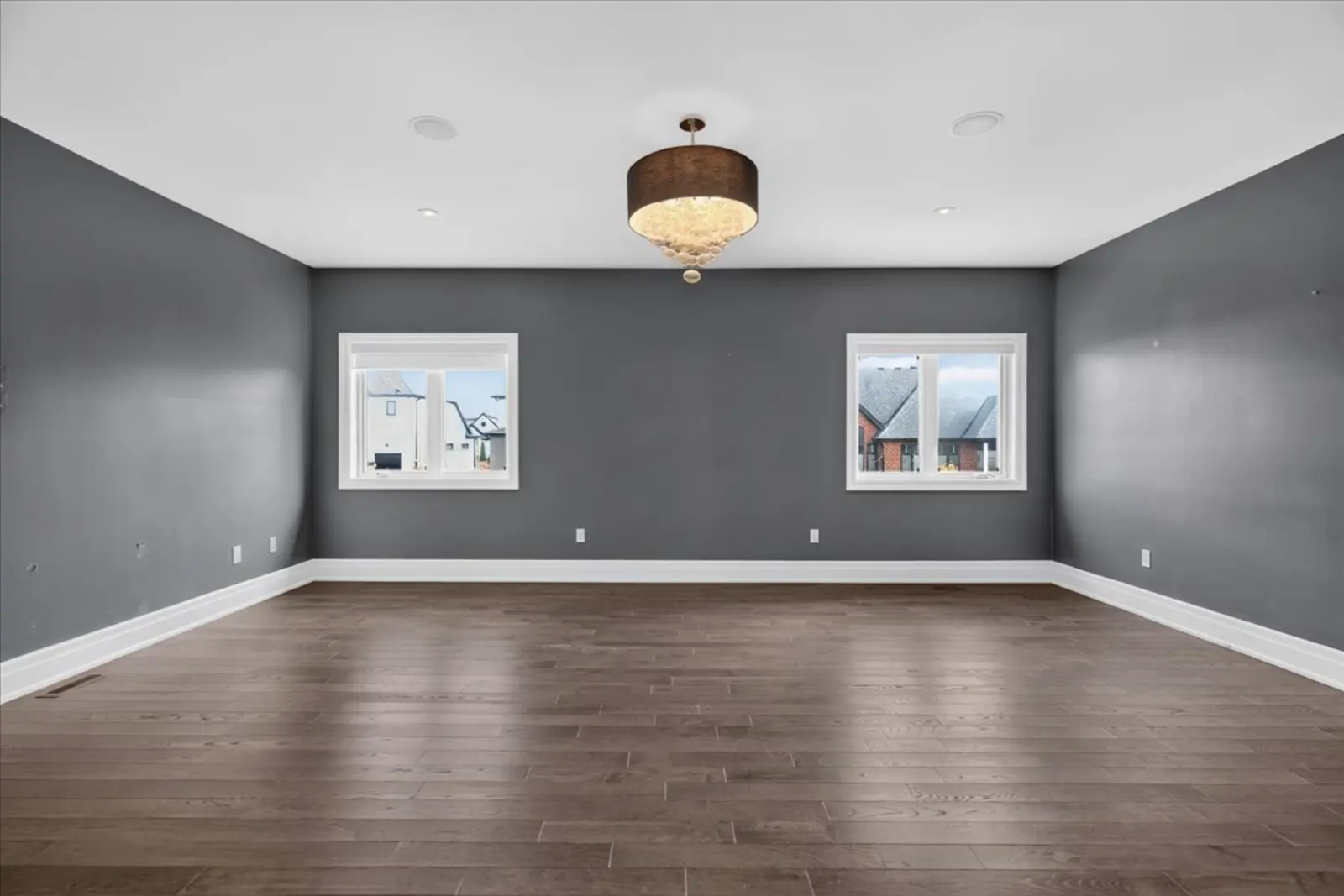 Primary suite with a chandelier