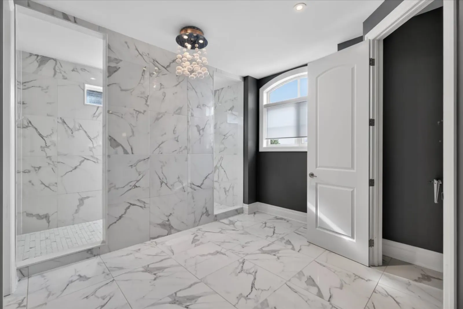 Oversized tile shower in the primary ensuite