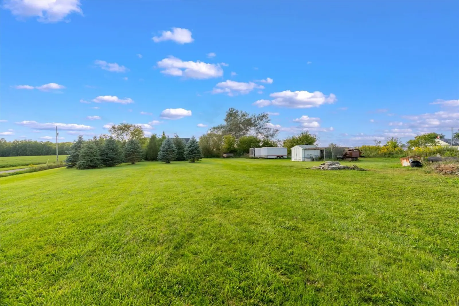 The open grass side of the lot