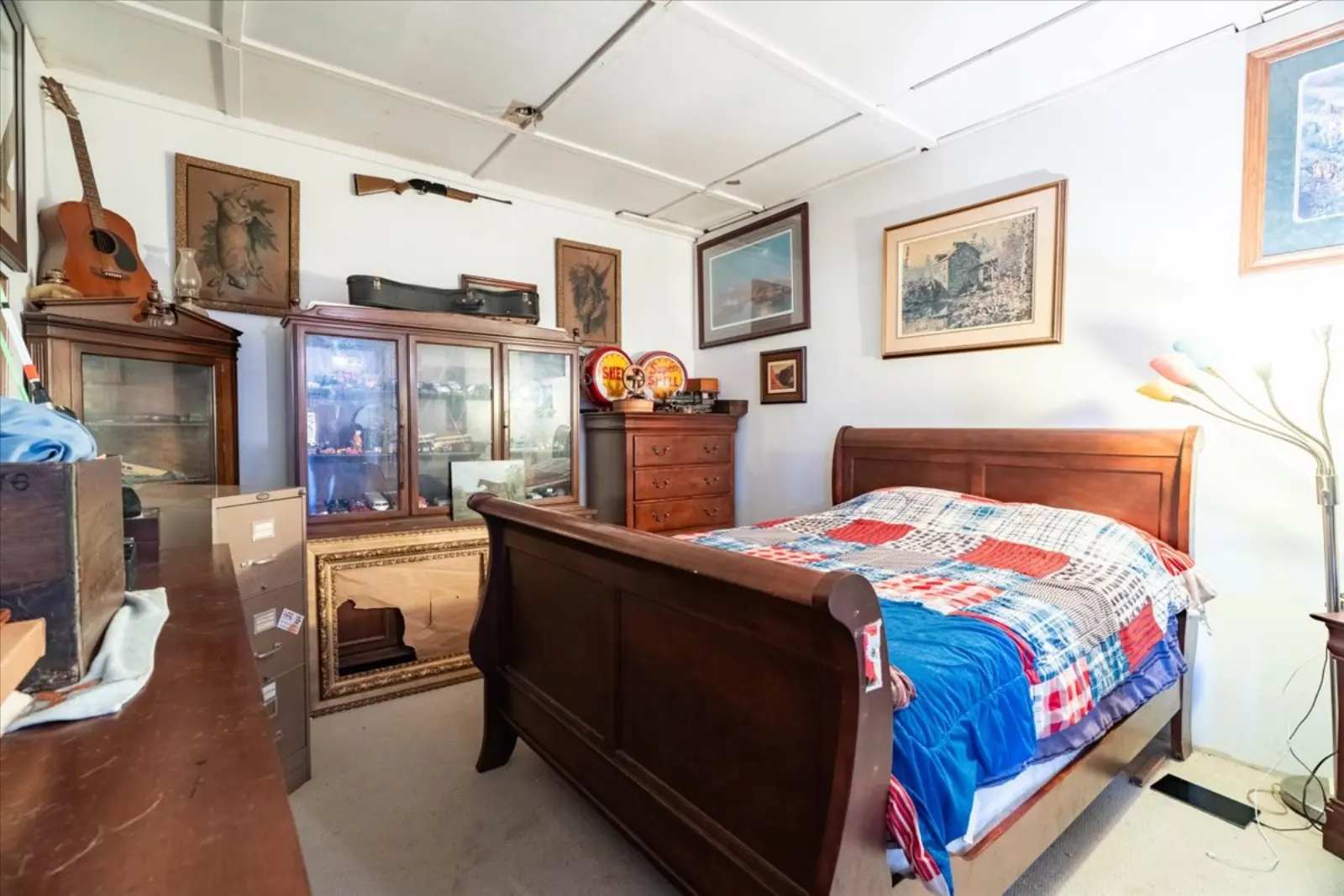 Bedroom with a wooden sleigh bed