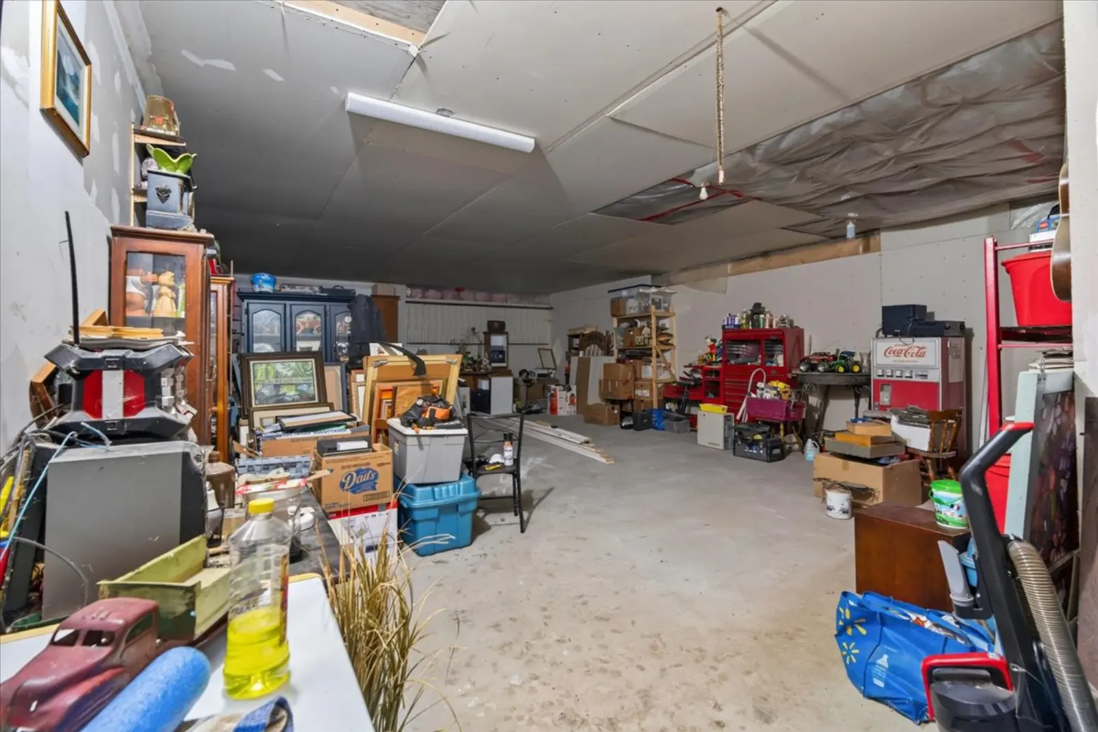 Large open workspace with a concrete floor