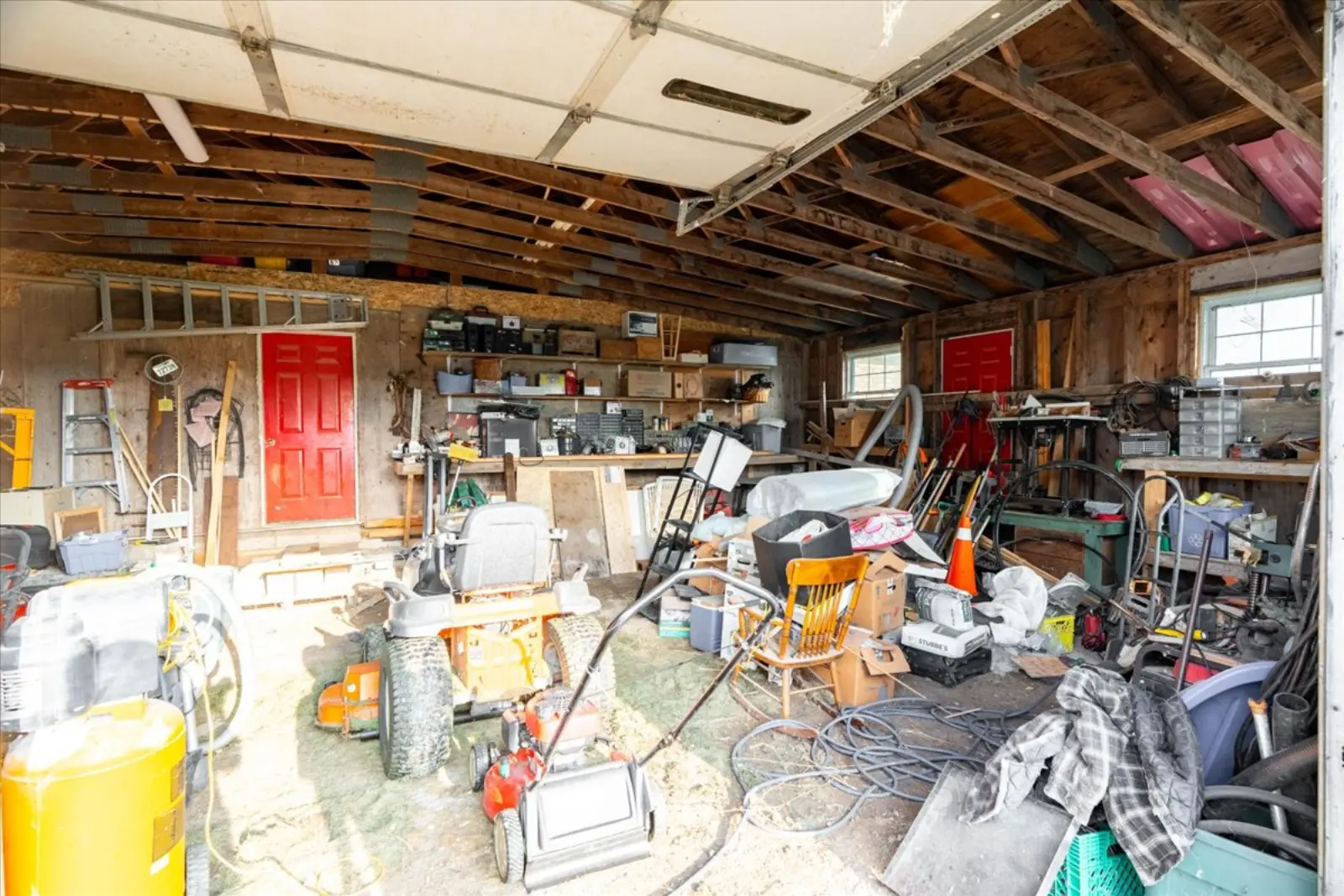 Garage workshop with open ceiling joists