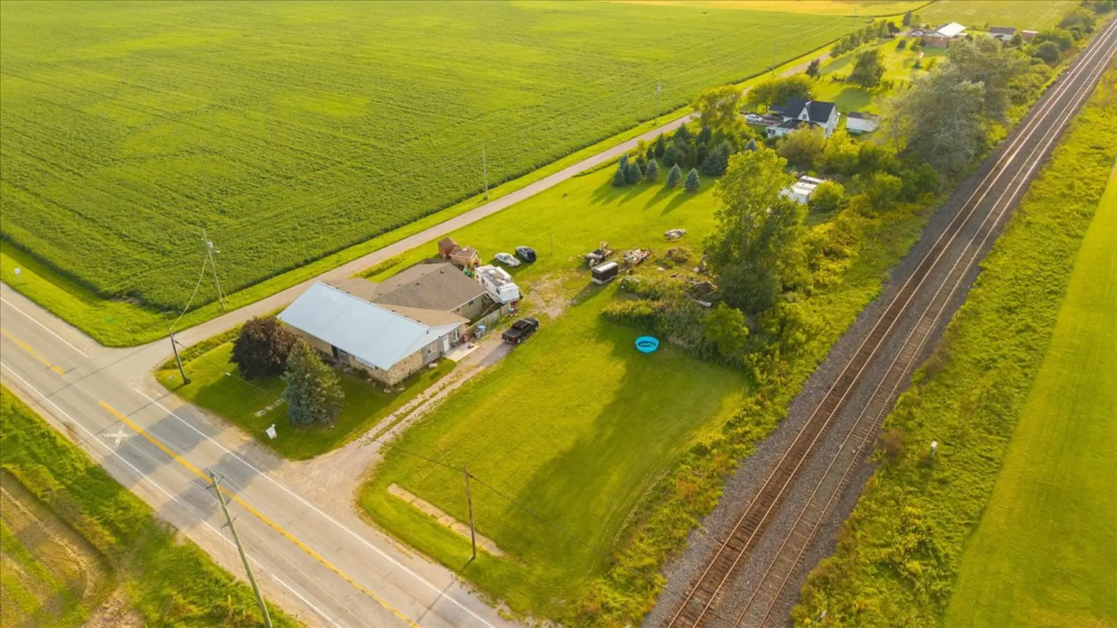 The property from the air beside the rail line and fields