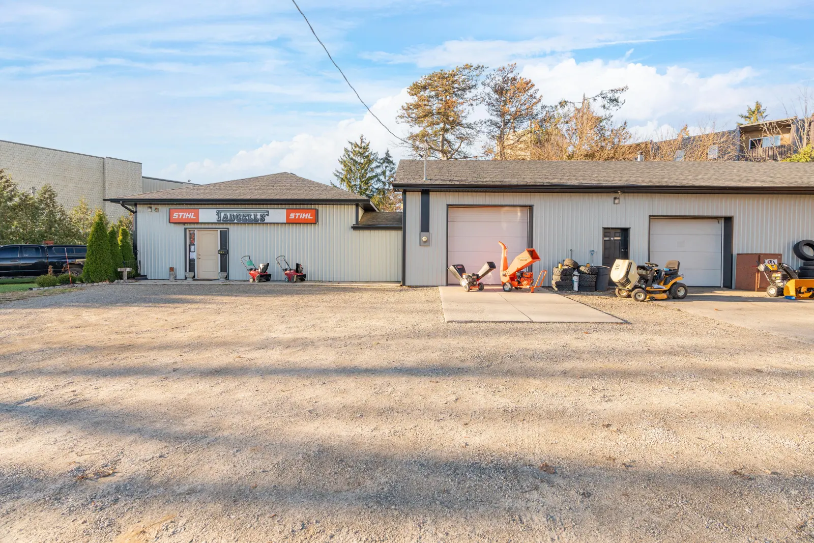 Gravel lot in front of the overhead doors