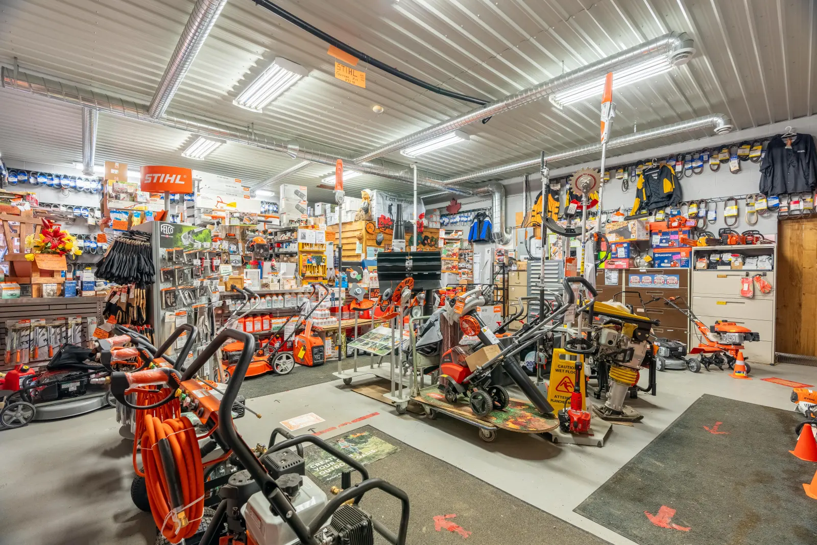 Showroom with a steel ceiling and bright lighting