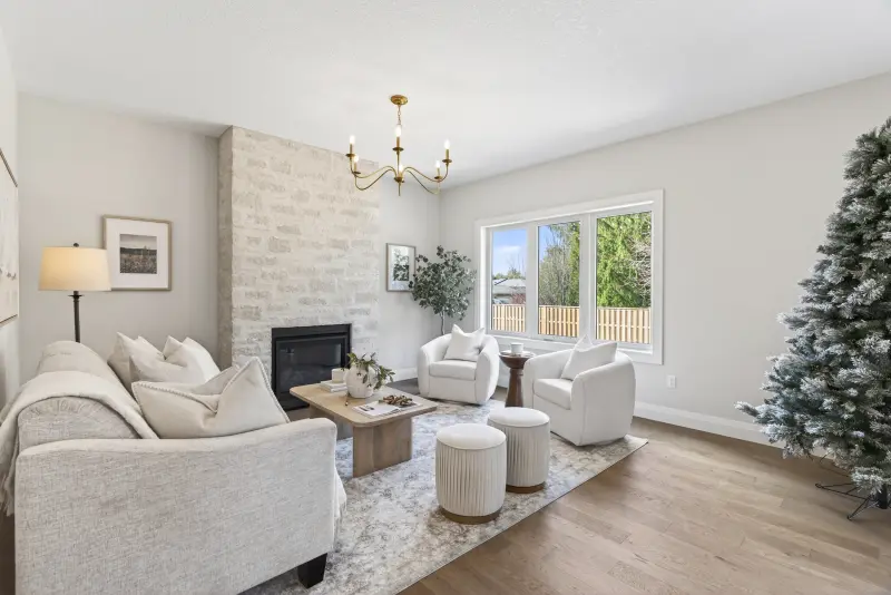 Model home: living room with a stone fireplace