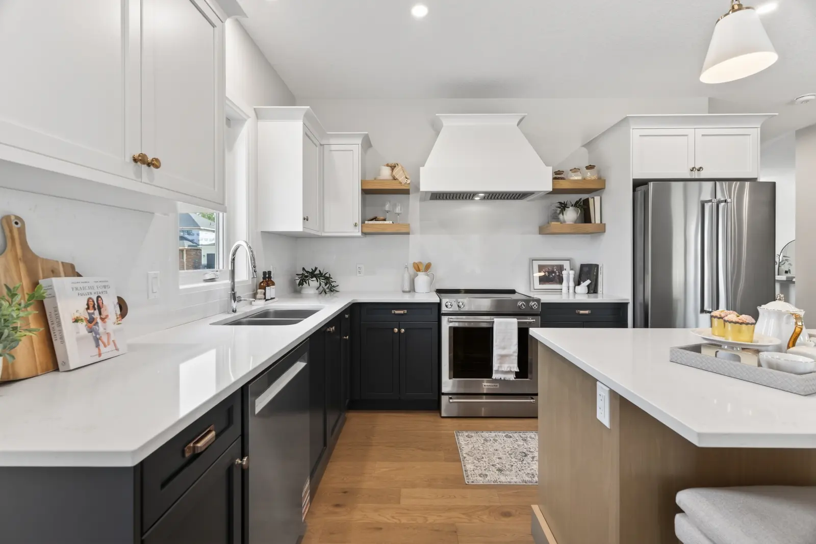 Model home: kitchen with a custom range hood