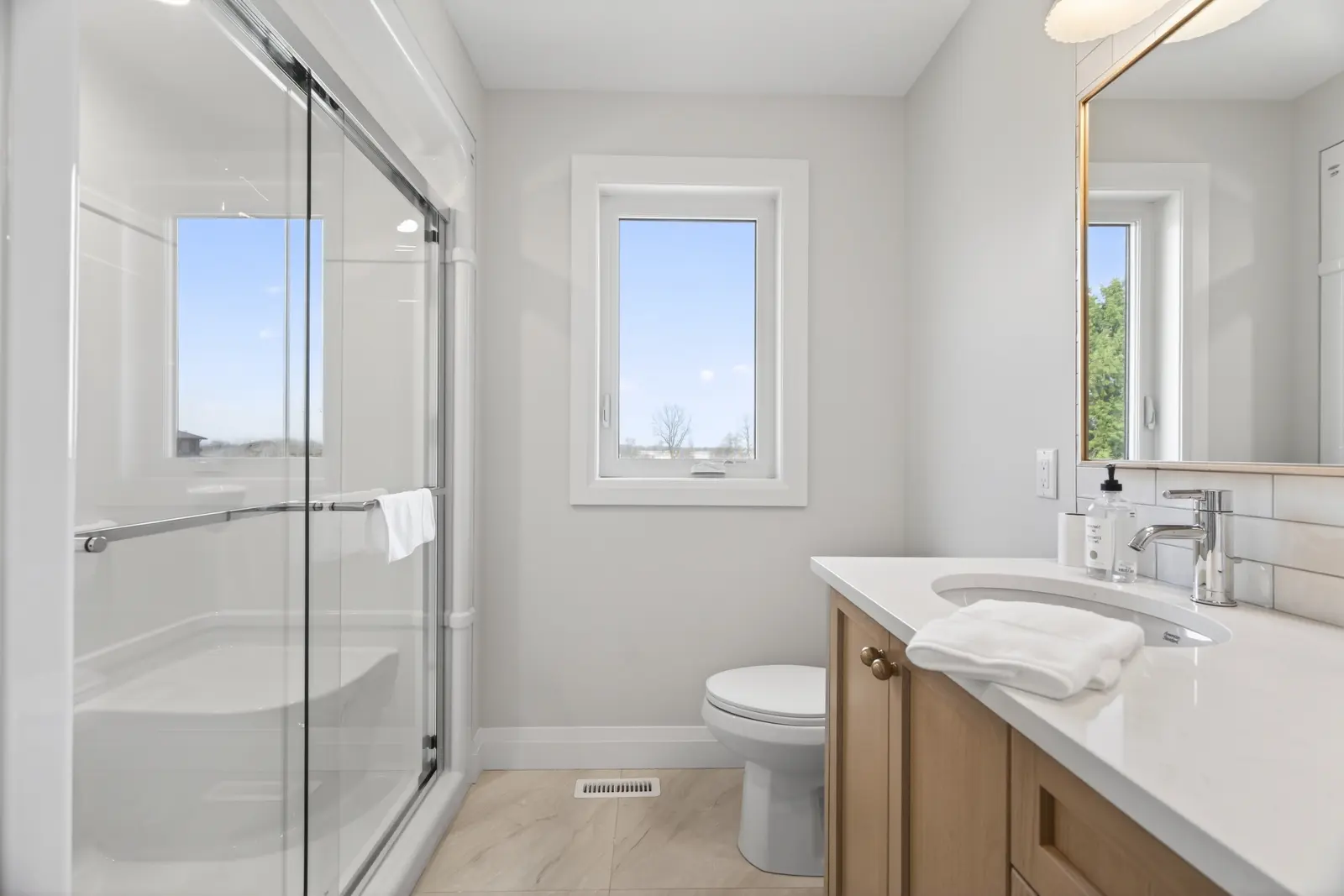 Model home: glass shower in the ensuite