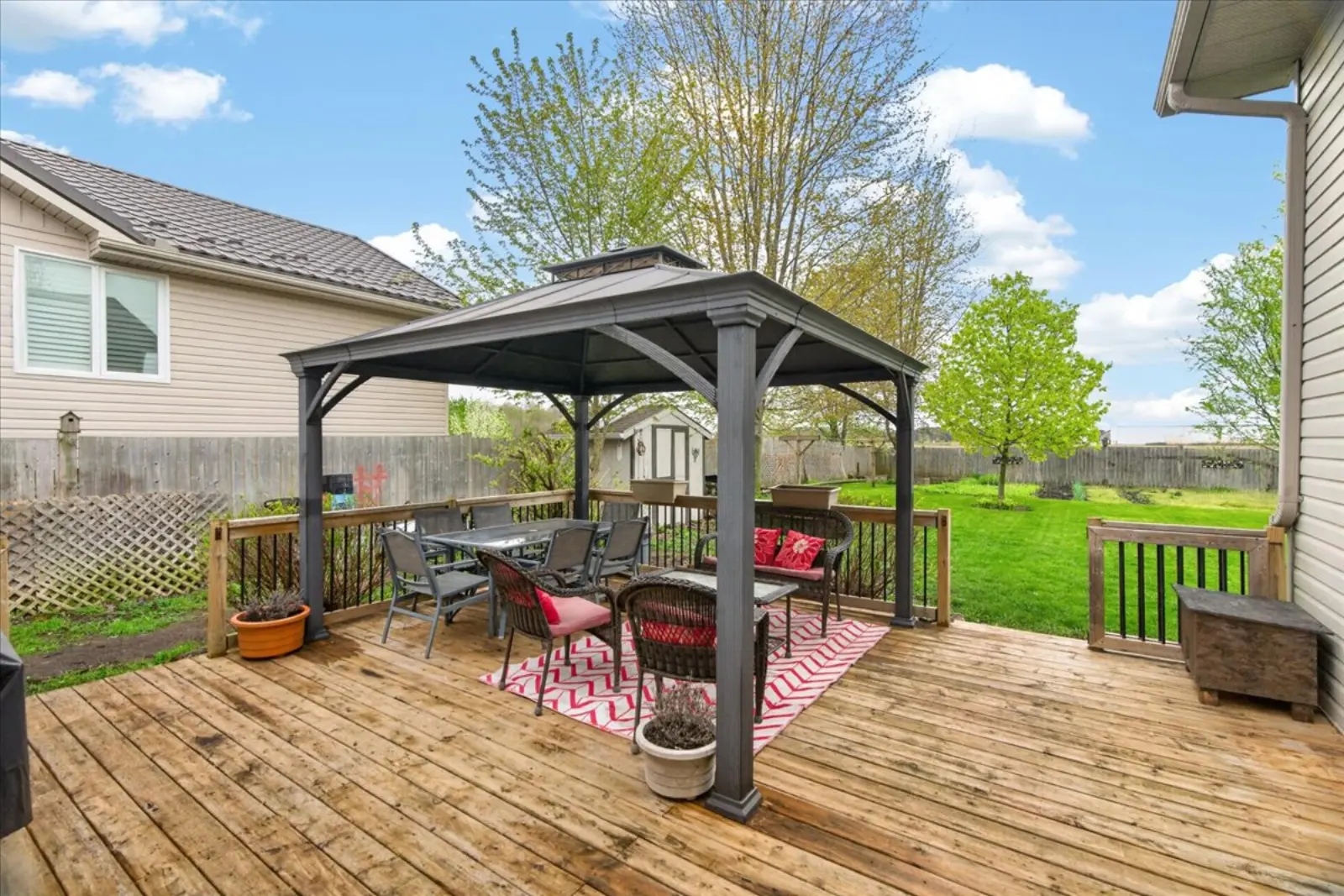 The deck and gazebo from the yard side