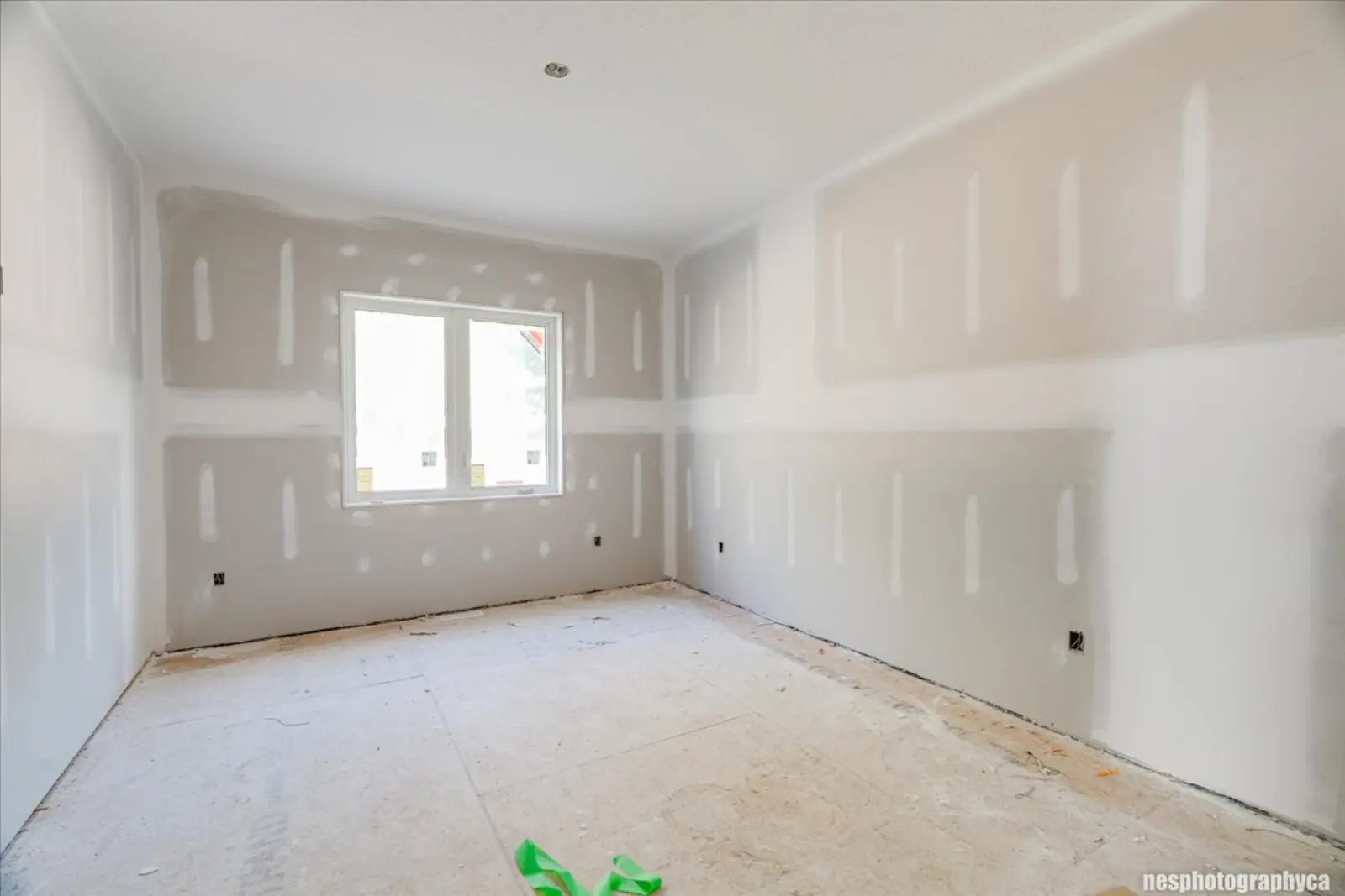 Bedroom with a window, at the drywall stage
