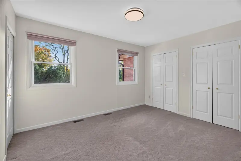 Bedroom with double closets