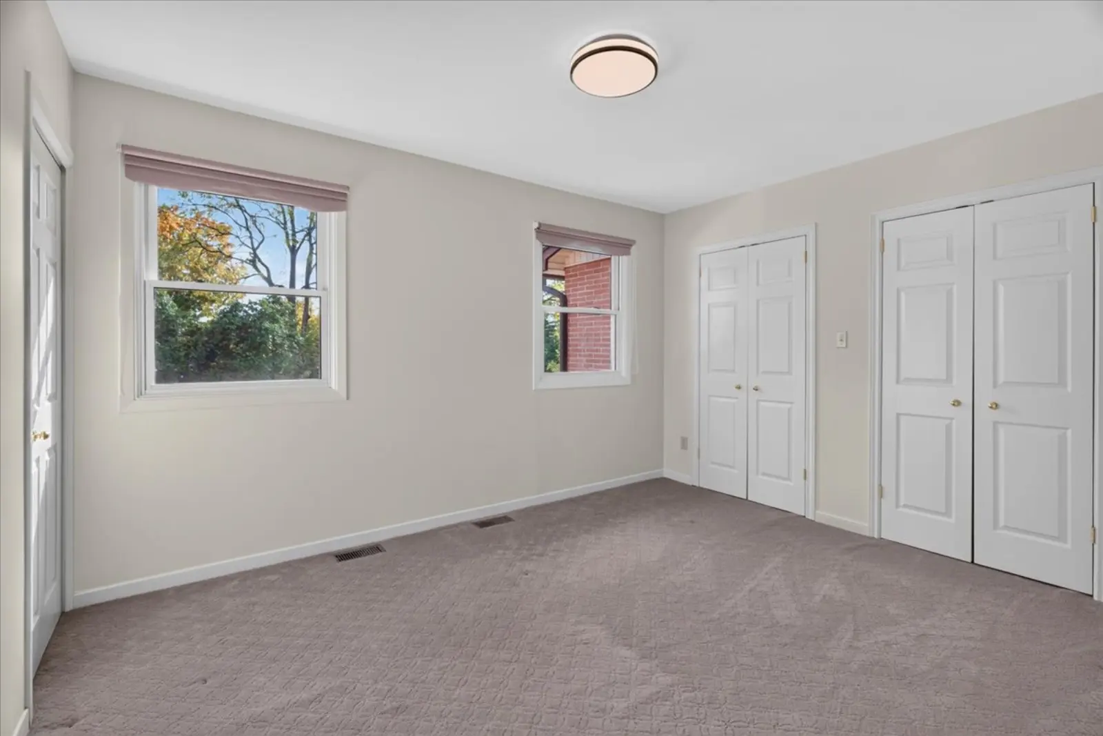 Bedroom with double closets
