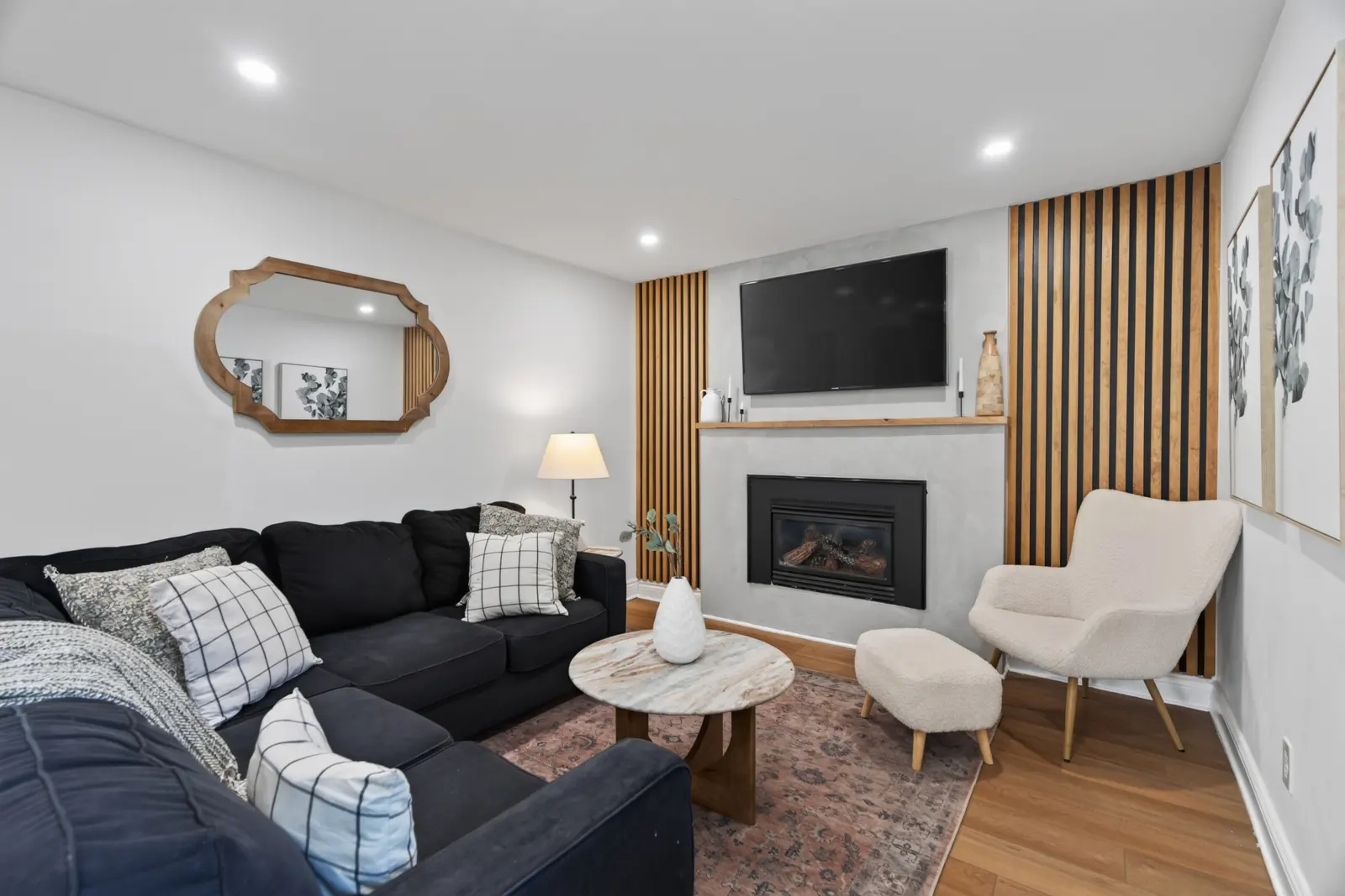 Family room with a stone-surround fireplace