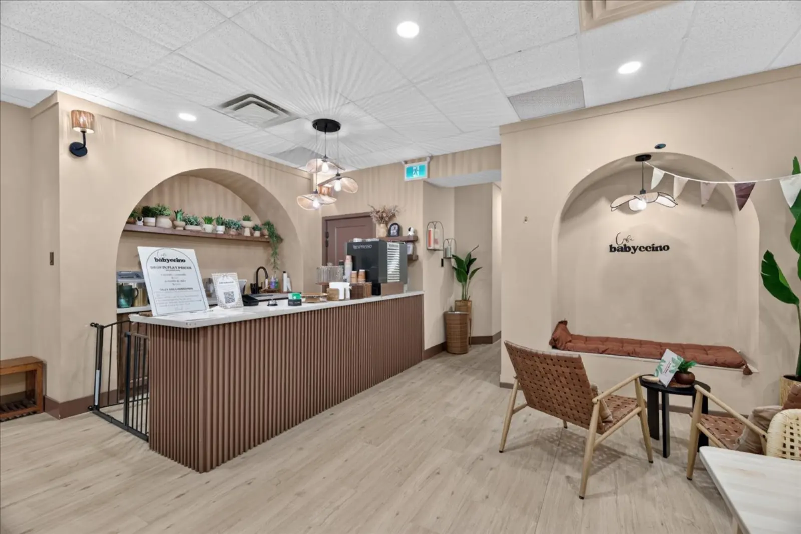 Service counter with an arched nook and lounge chairs