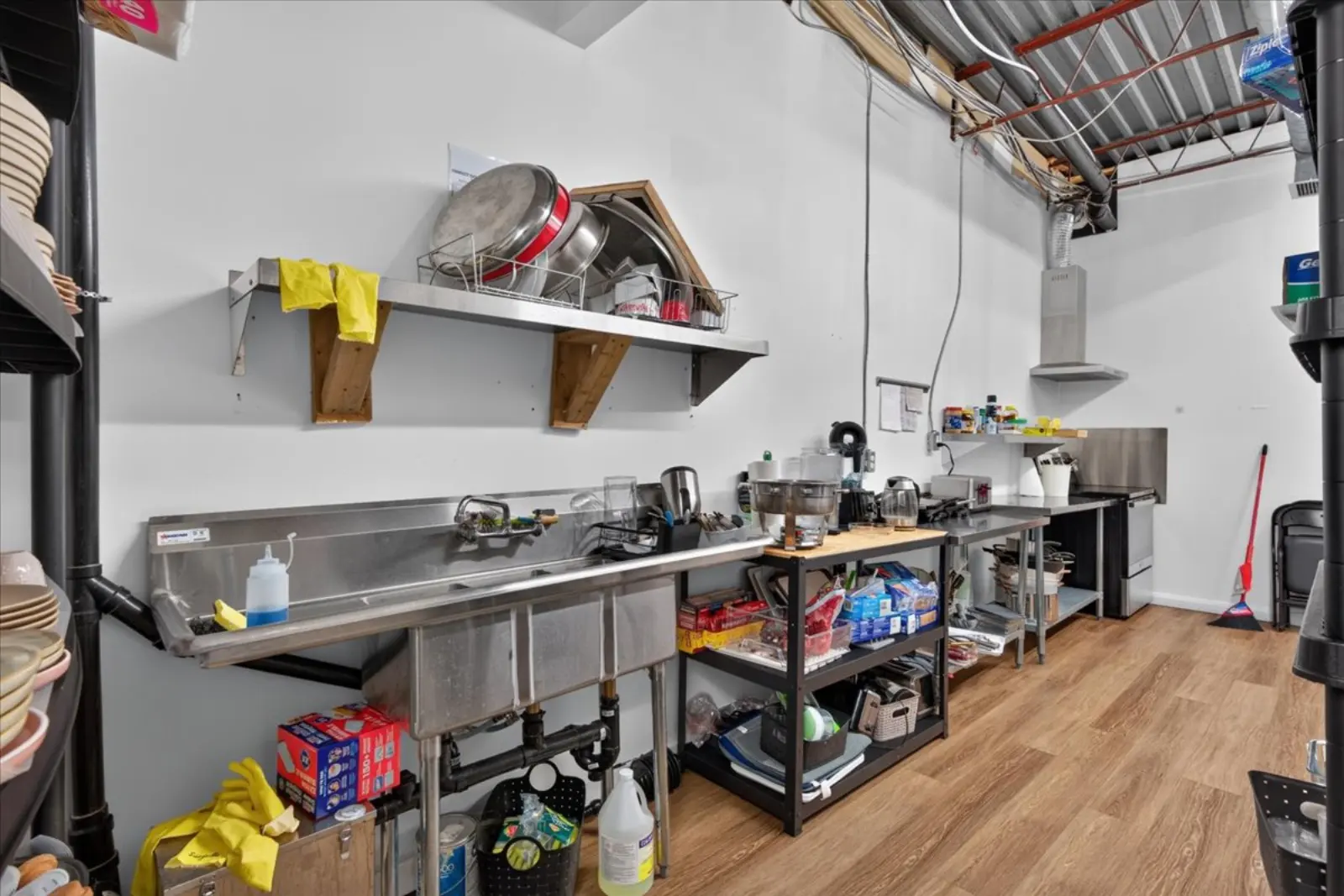 Kitchen prep area with stainless steel tables