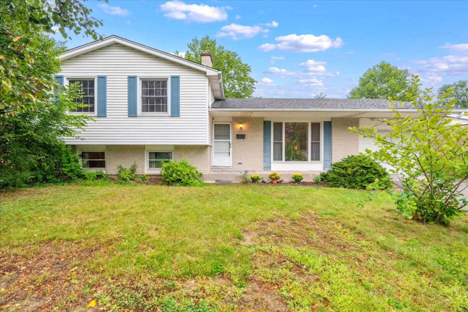 Front of the side split with a green lawn