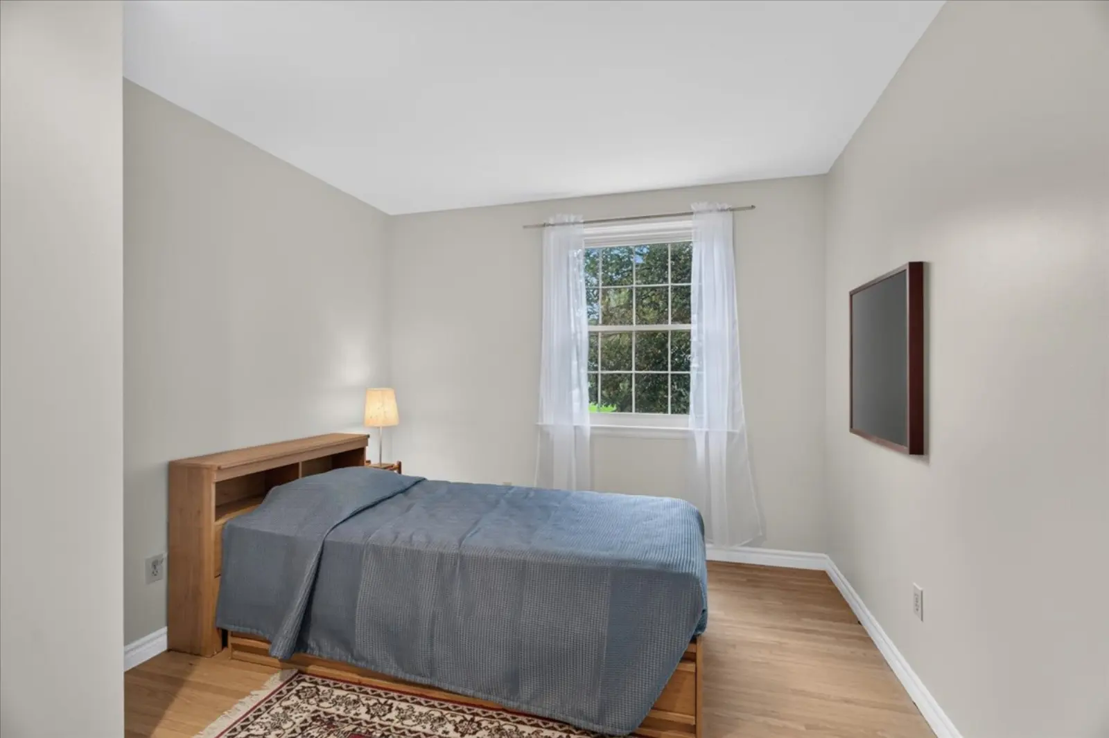 Bedroom with hardwood floors