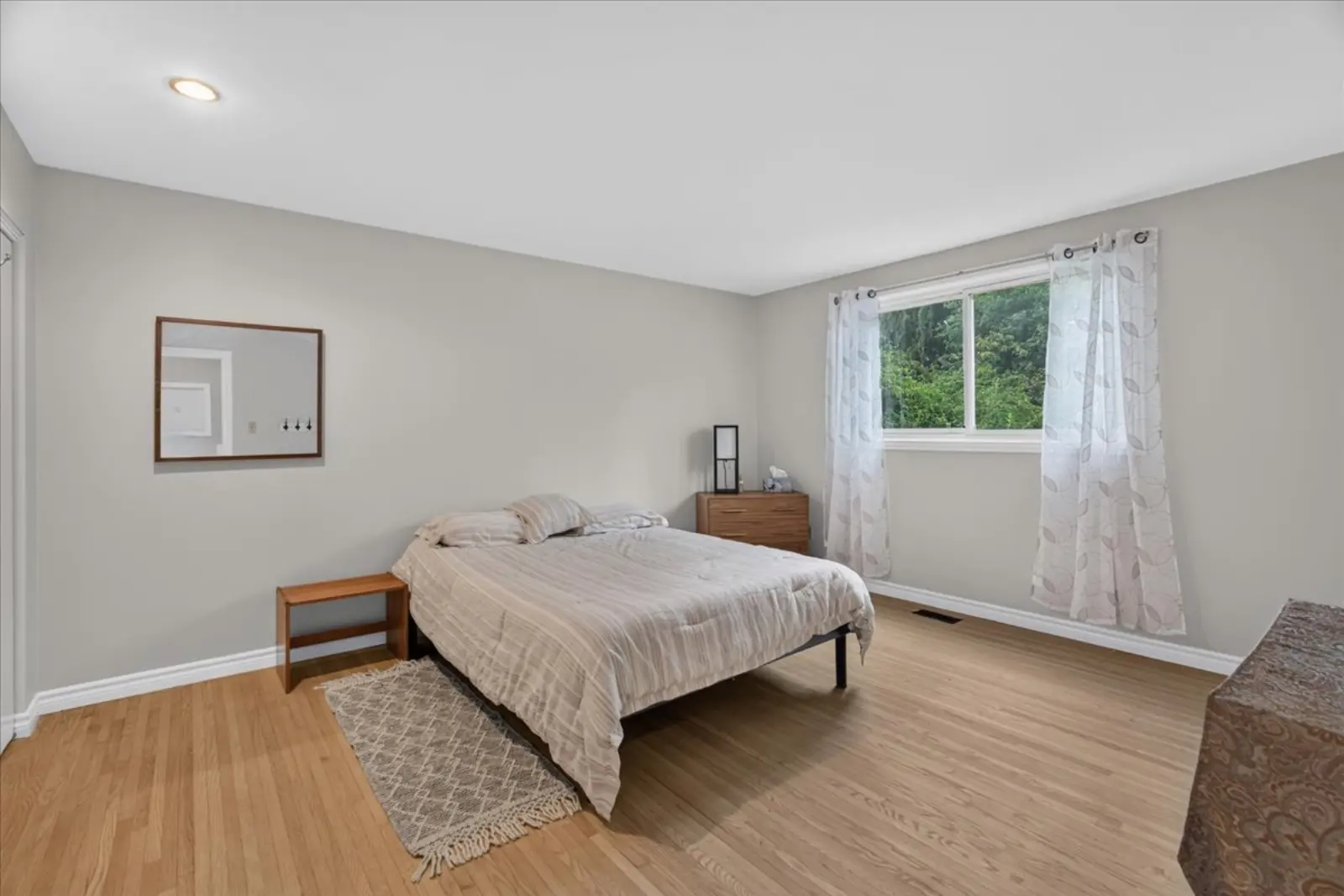 Bedroom with hardwood floors