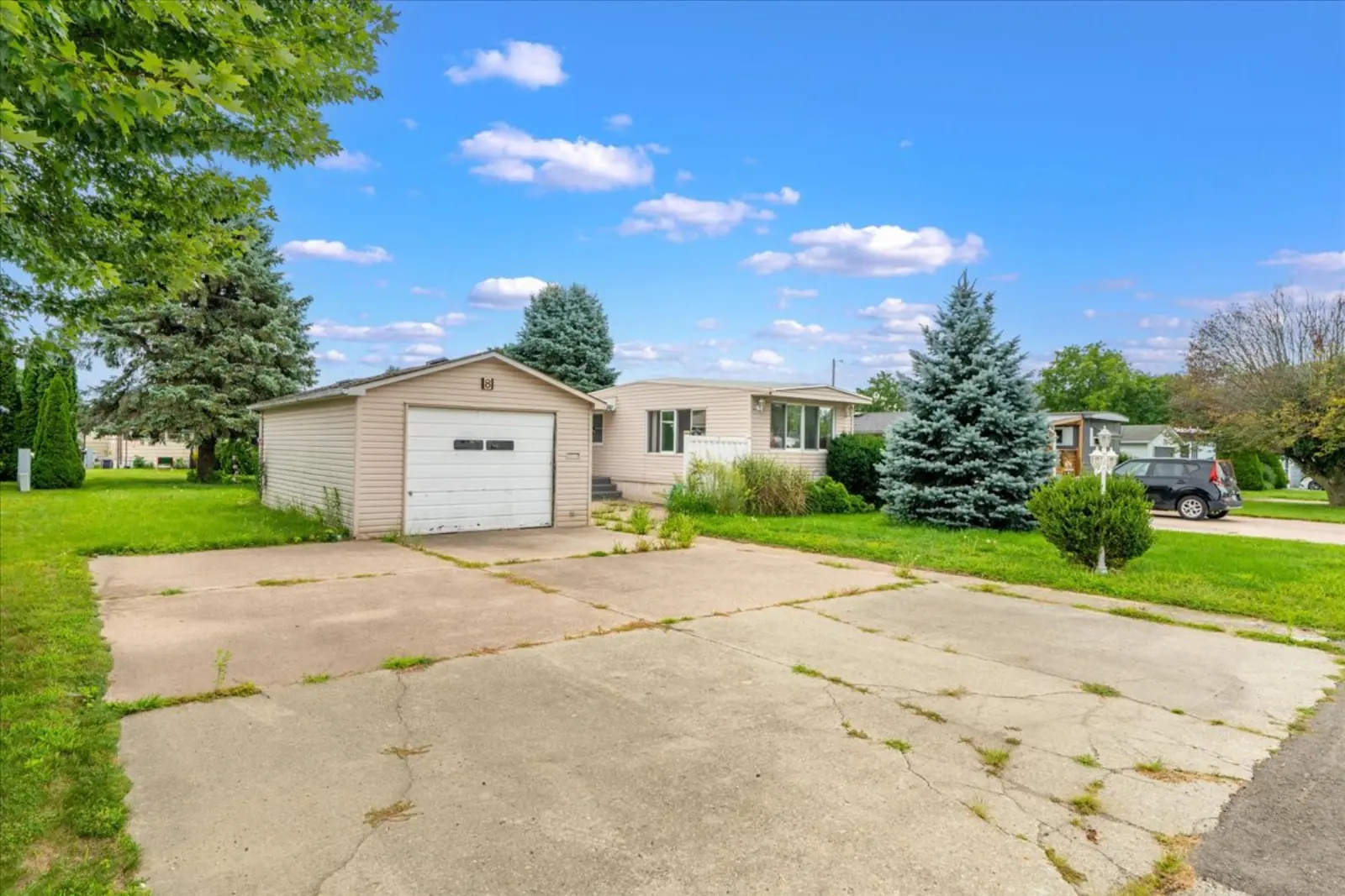 Detached garage and double driveway