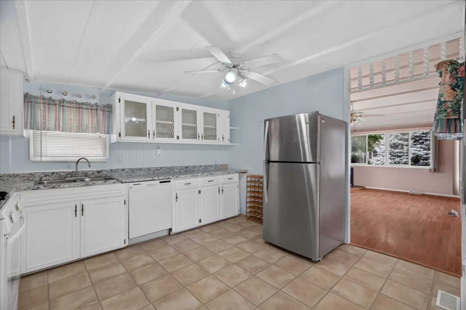 Kitchen with a stainless fridge