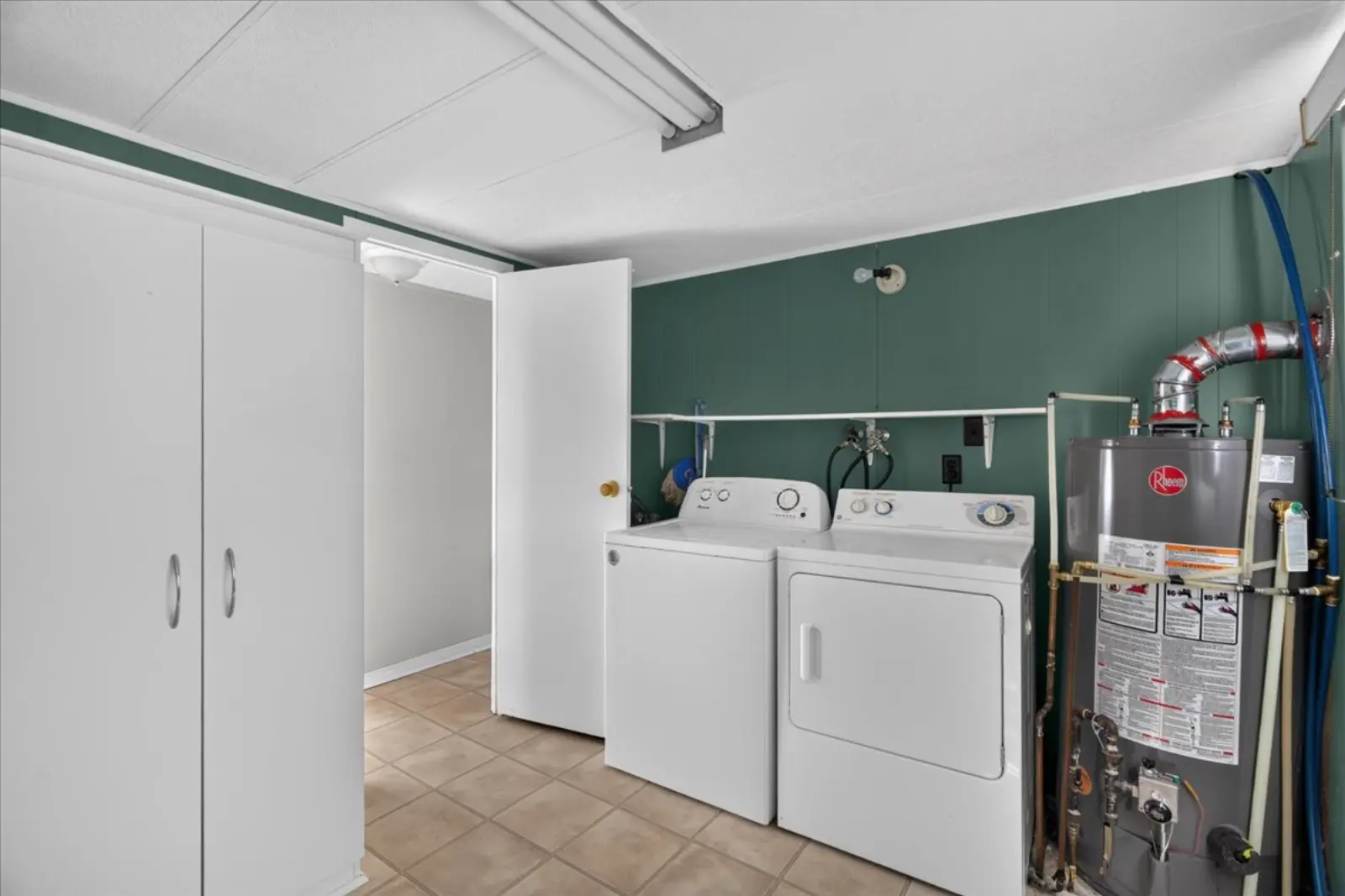 Laundry room with washer and dryer